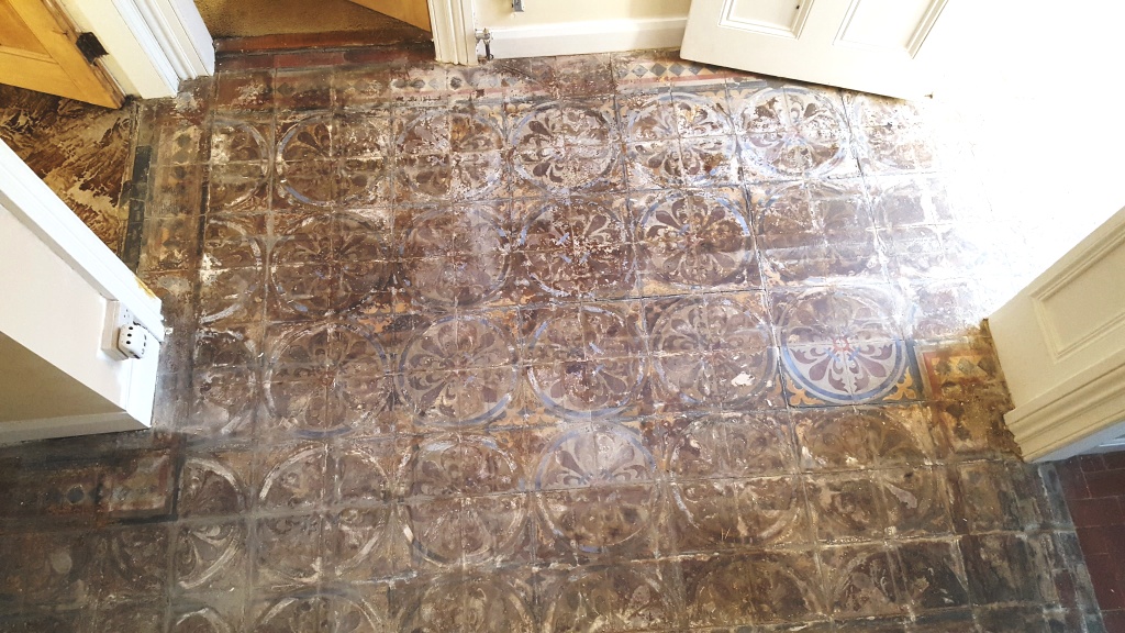 Encaustic tiled hallway before restoration in Chester