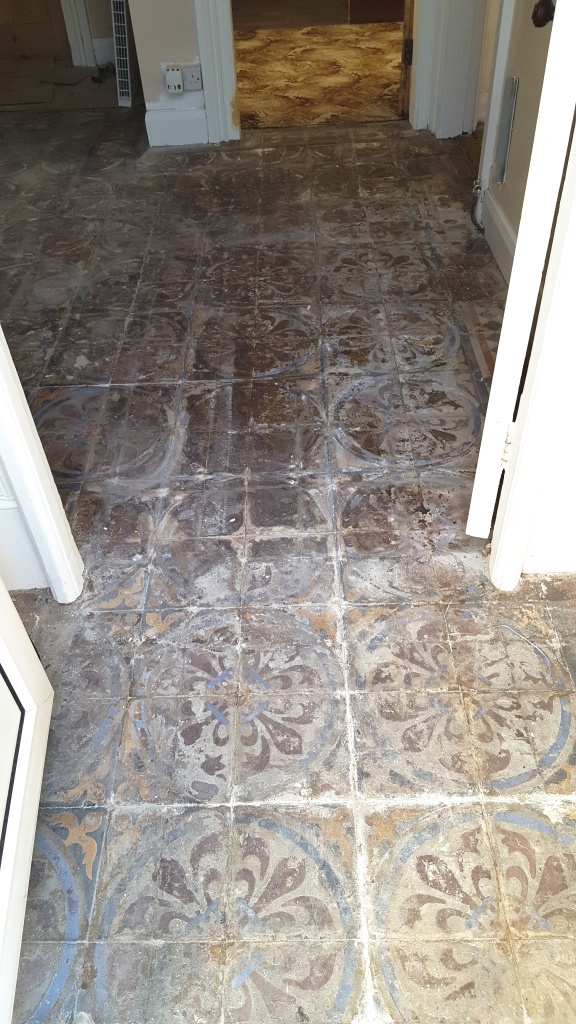Encaustic tiled hallway before restoration in Chester